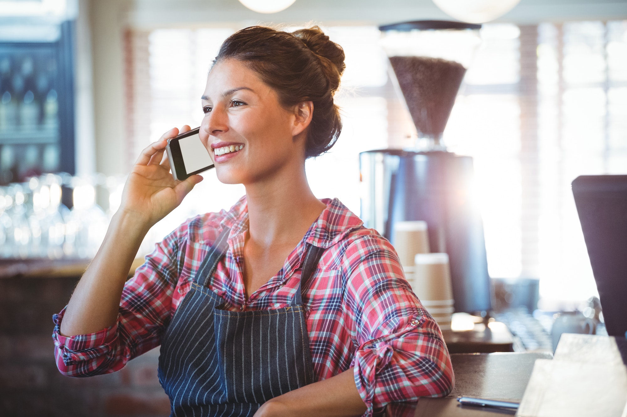 Waitress making a phone call