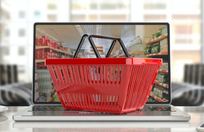 Supermarket online shopping. Shopping basket on a laptop.3d illustration